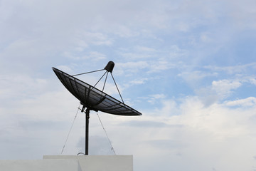 Satellite dish with sky background