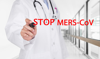 Doctor writing Stop Mers-Cov text on transparent board 