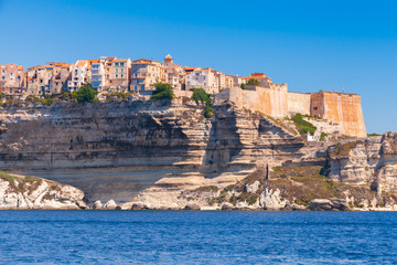Fototapeta na wymiar Old living houses and fortress on the cliff. Bonifacio