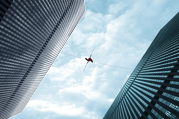 Highline Walker on the Rope High in the Sky