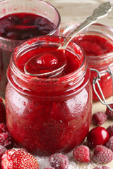 Jam in jar and spoon