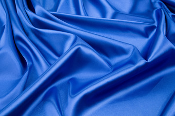 Close up of blue silk. Texture.