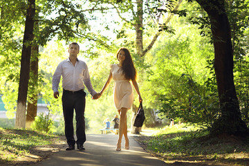 Fototapeta premium Young couple on a walk in the city of love story