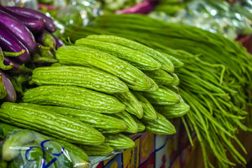Heap of chinese bitter melon fruit (Momordica charantia) for sale