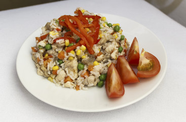 chicken risotto on a plate white background