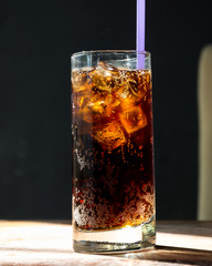 glass of cola with ice