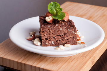 chocolate pie with nuts, decorated mint