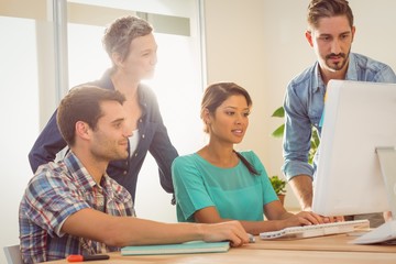 young designer using laptop