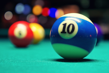 Billiard balls in pool hall