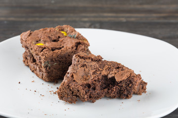 brownies in plate on wood table
