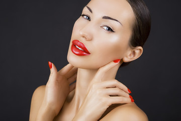 Beautiful Sexy Young Girl with Red Lips and Red Nail Polish, Bri