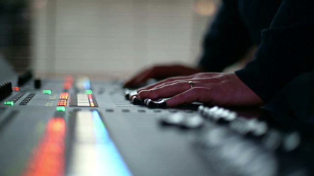 Man mixing sound at professional sound mixer