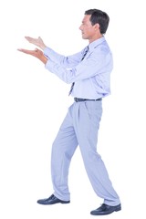  Businessman walking while gesturing with hands