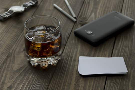 whiskey, phone, clock