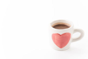 a cup of chocolate on white