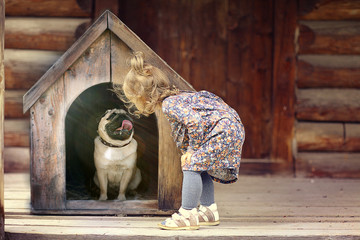 girl and small dog, dog house