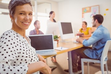 Smiling businesswoman looking at the camera