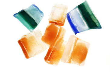 Slices of ice with alternating colors with white background 
