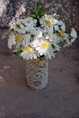 Spring bouquet of white daisies