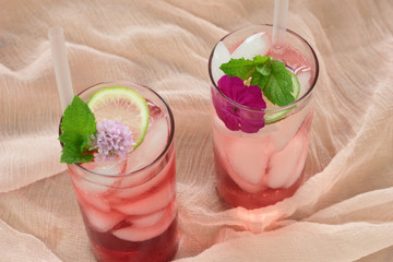 Glass of freshly prepared, cold and refreshing pomegranate drink.