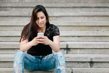 Young woman texting