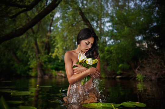 beautiful young woman relaxed in water