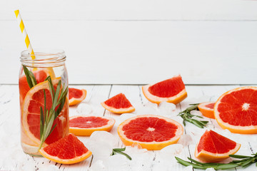 Detox fruit infused flavored water. Refreshing summer homemade cocktail