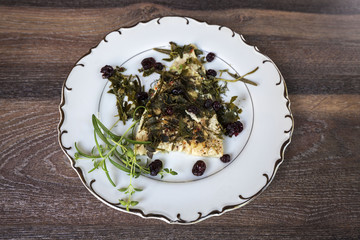 Cod with cranberries, thyme and rosemary