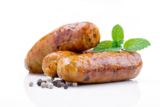 smoked sausage against on white background