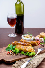 Grilled sausage with vegetables and mustard