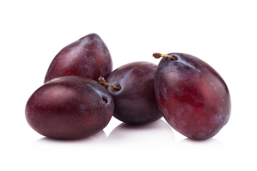 ripe prune or plum isolated on a white background.