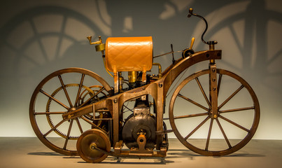Wooden retro motorcycle. 1985 Motorcycle model. First motorcycle made in Germany by Daimler &...