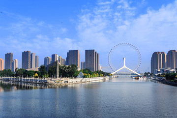 modern buildings in urban city at riverbank