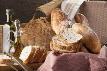 Bread, a set of variation of breads on a wood chopping block with spike