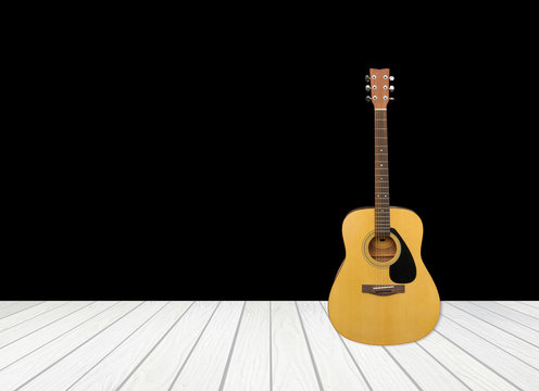 guitar with white wood floor