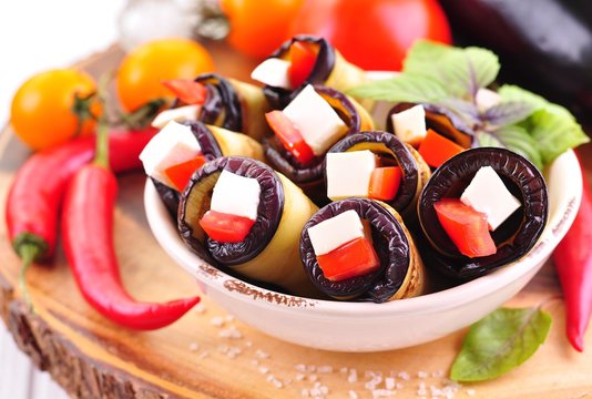 Rolls Of Eggplant With Tomatoes And Goat Cheese