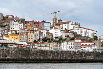 Coast of the River Douro with its beautiful architecture in Porto, Portugal. View from the River Douro, one of the major rivers of the Iberian Peninsula (2157 m)