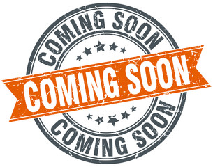 coming soon round orange grungy vintage isolated stamp