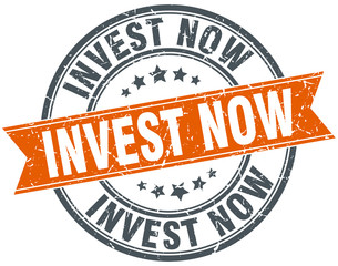invest now round orange grungy vintage isolated stamp