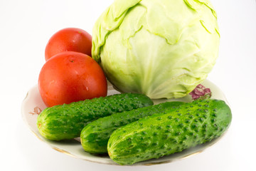 Cucumber and tomato with measuring