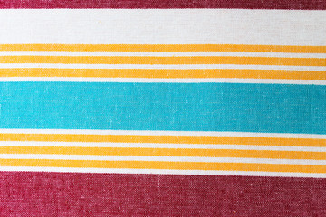 horizontal blank image of different size stripes in blue and yellow and red great as background shot