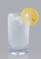 Seltzer Drink with Fresh cut lemon wedge and ice