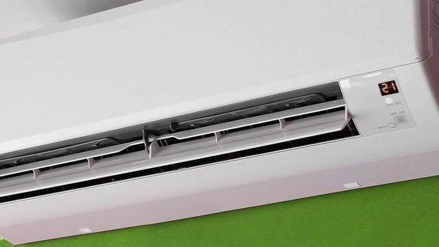 Split-system air conditioner on wall
