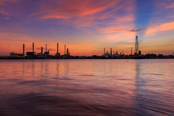 Fototapeta premium Oil refinery along the river at Dusk (Bangkok, Thailand)