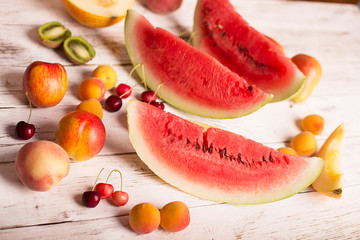 Sliced watermelon and fruits