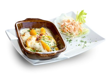 Baked chicken on peaches