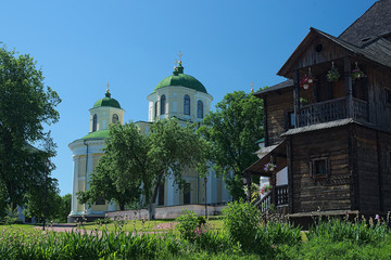 The old stone church and wooden house (Spaso preobrazhenskiy sob