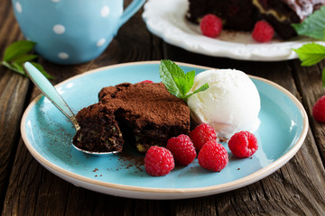 Brownie with raspberries and cheese filling.