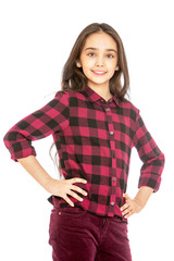 Charming long-haired girl in a plaid shirt and corduroy jeans