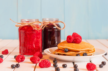 Stack of wheat golden pancakes or pancake cake with freshly